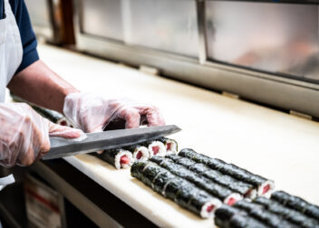 Sushi preparation at One World Market in Novi