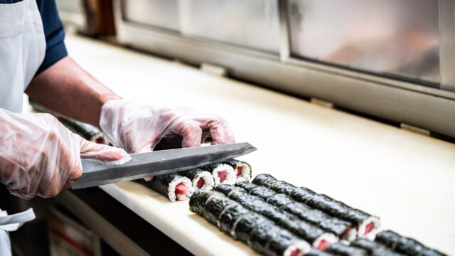 Sushi preparation at One World Market in Novi