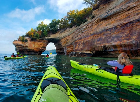 Kayakers at Pictured Rocks shoreline